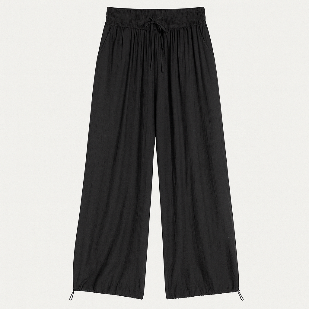 textured wide-leg lounge pants with drawstring waist and cinched hems, styled casually for relaxed wear.
