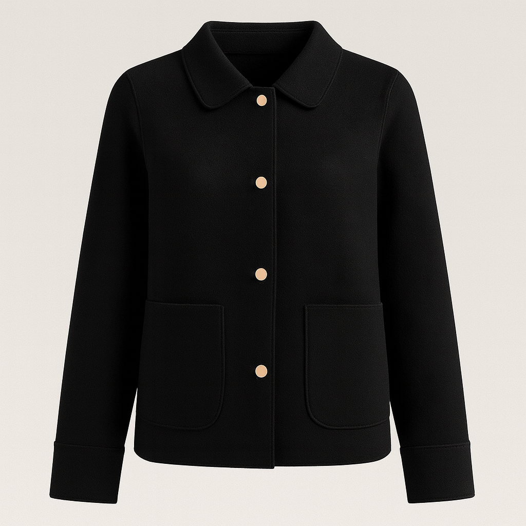 Beige tailored jacket with front buttons, large patch pockets, and a clean silhouette, styled with a black turtleneck and cream pants.