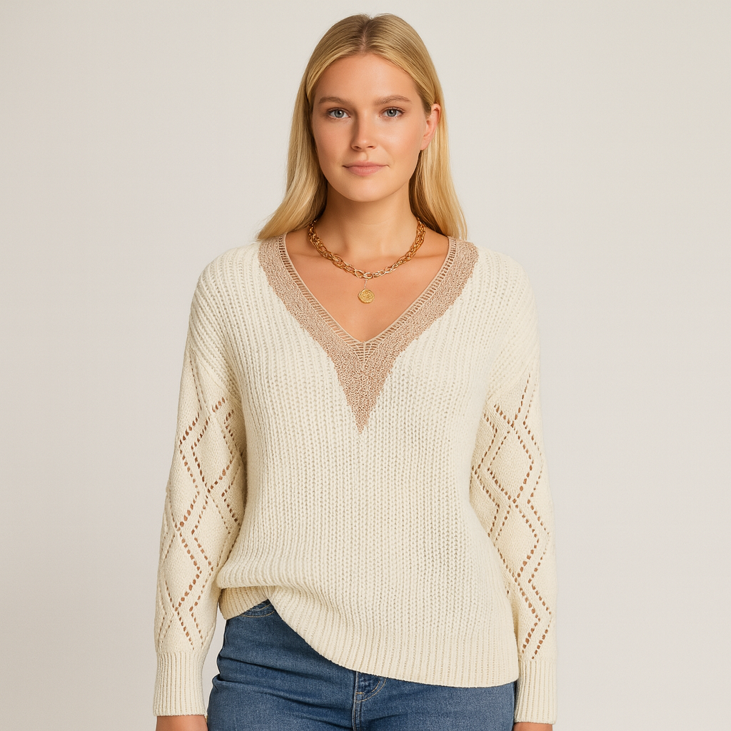Knit sweater with deep V-neckline, ribbed texture, and long sleeves featuring diamond-pattern openwork design