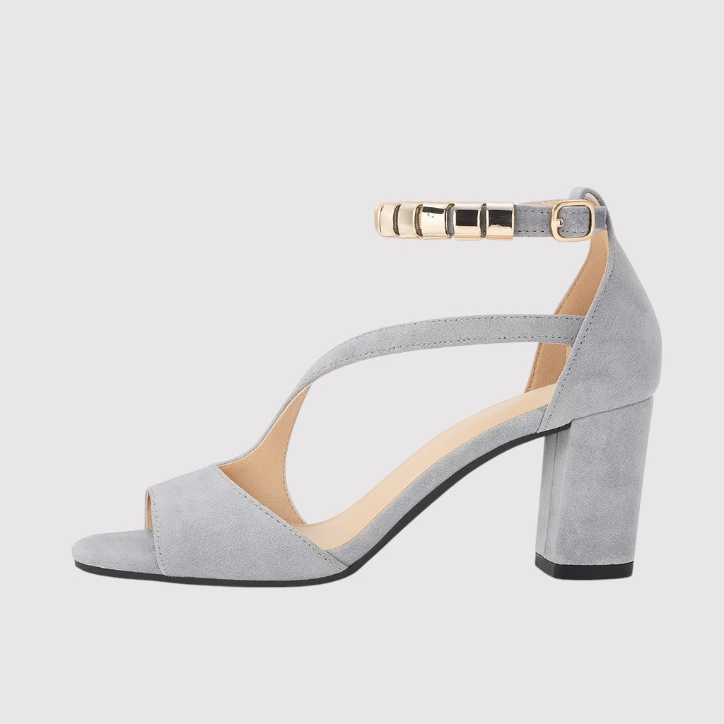 Sandals with open toe, block heel, asymmetric straps, and metallic ankle strap detailing