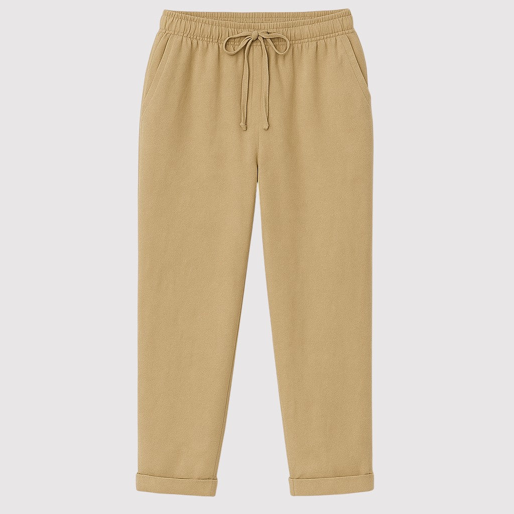 Relaxed linen drawstring pants with straight-leg fit and elastic waistband, styled for a casual everyday look