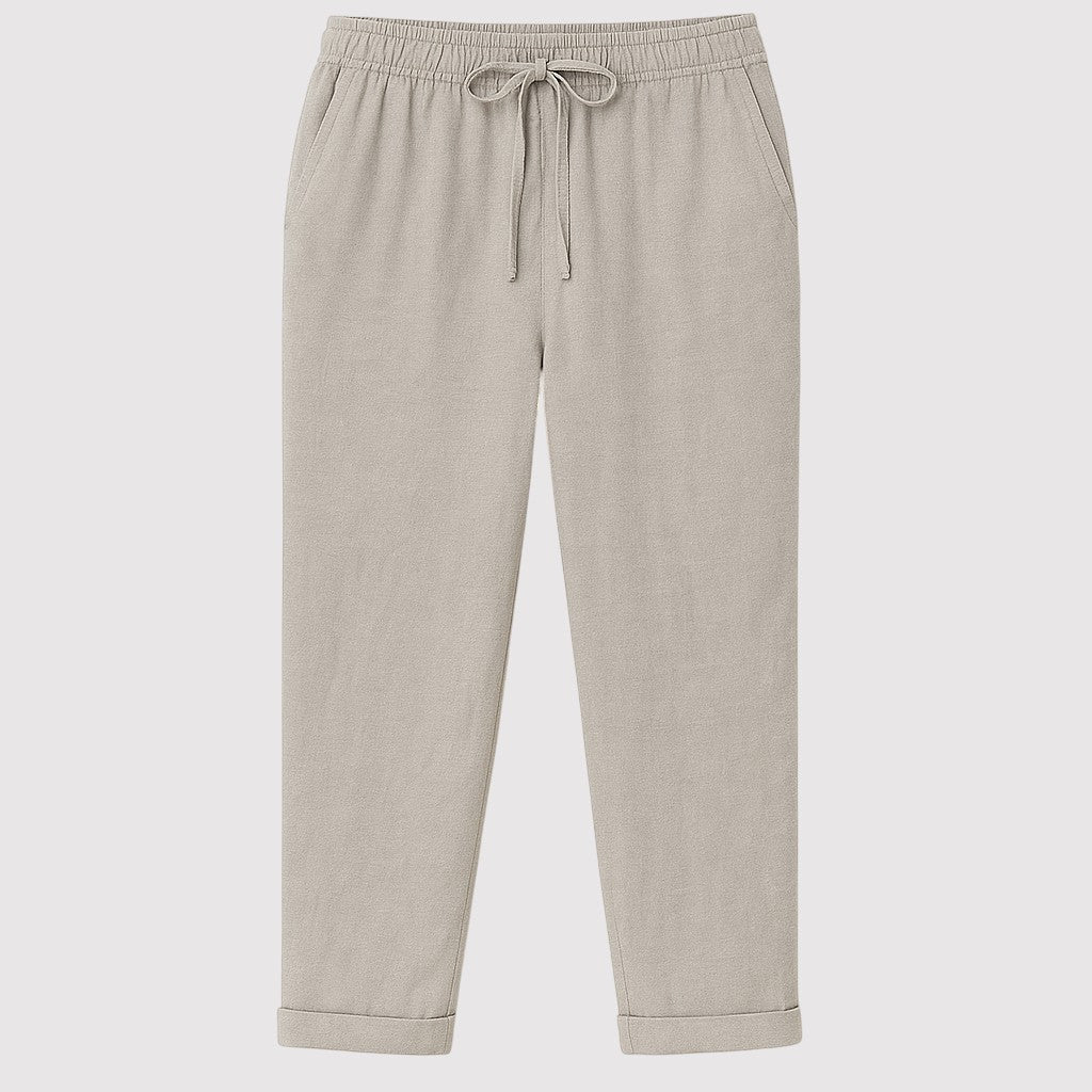 Relaxed linen drawstring pants with straight-leg fit and elastic waistband, styled for a casual everyday look