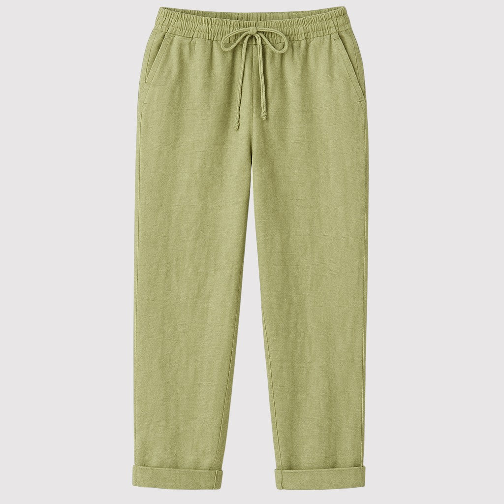 Relaxed linen drawstring pants with straight-leg fit and elastic waistband, styled for a casual everyday look