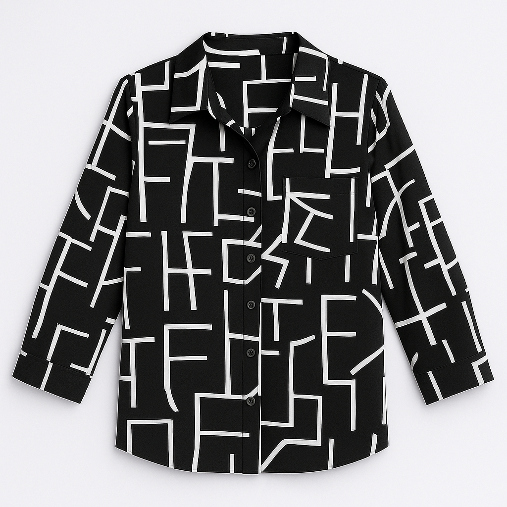 Button-up shirt with a bold blue and pink abstract animal print, featuring a pointed collar and long sleeves.