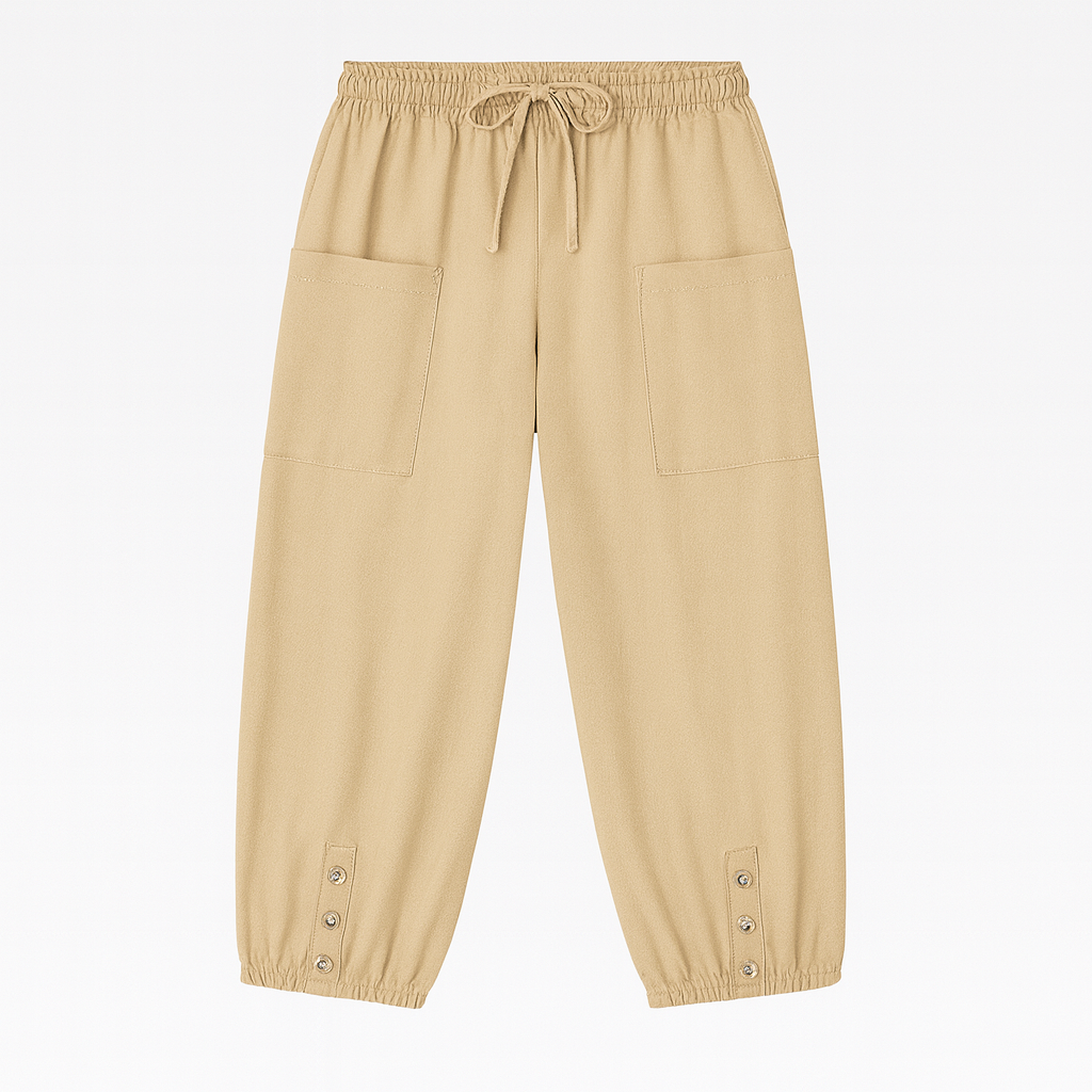 Relaxed jogger pants with elastic waistband, patch pockets, and buttoned hem details, styled for casual everyday wear