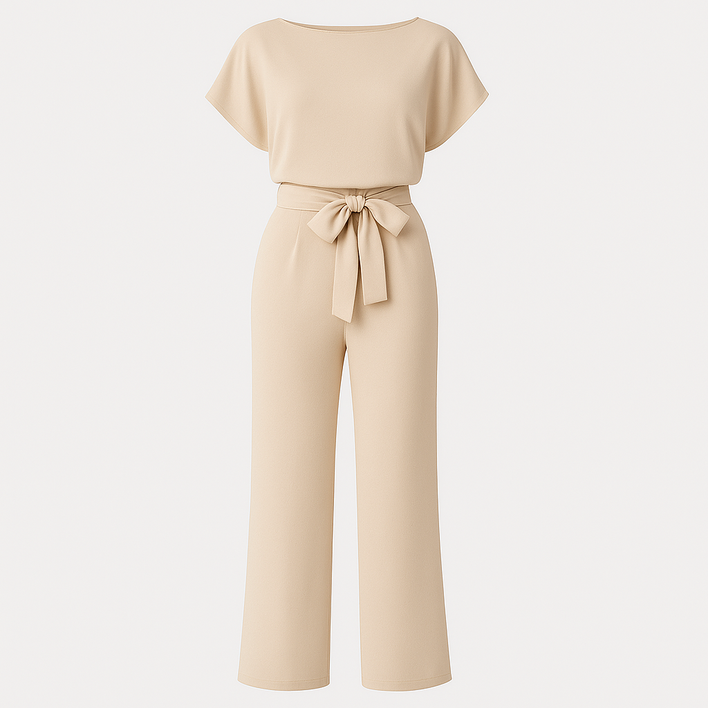 A short-sleeve jumpsuit featuring a boat neckline, a wide fabric belt tied in a bow at the waist, and straight-leg pants for a modern, minimalist silhouette.