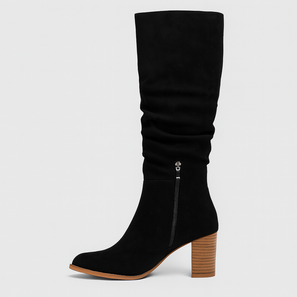 Suede knee-high boots with ruched slouch effect, pointed toe, stacked block heel, and side zip fastening.