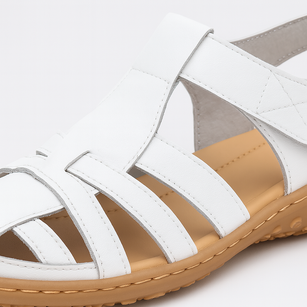 Slingback sandal with closed toe design, multiple cutout straps, and cushioned sole.