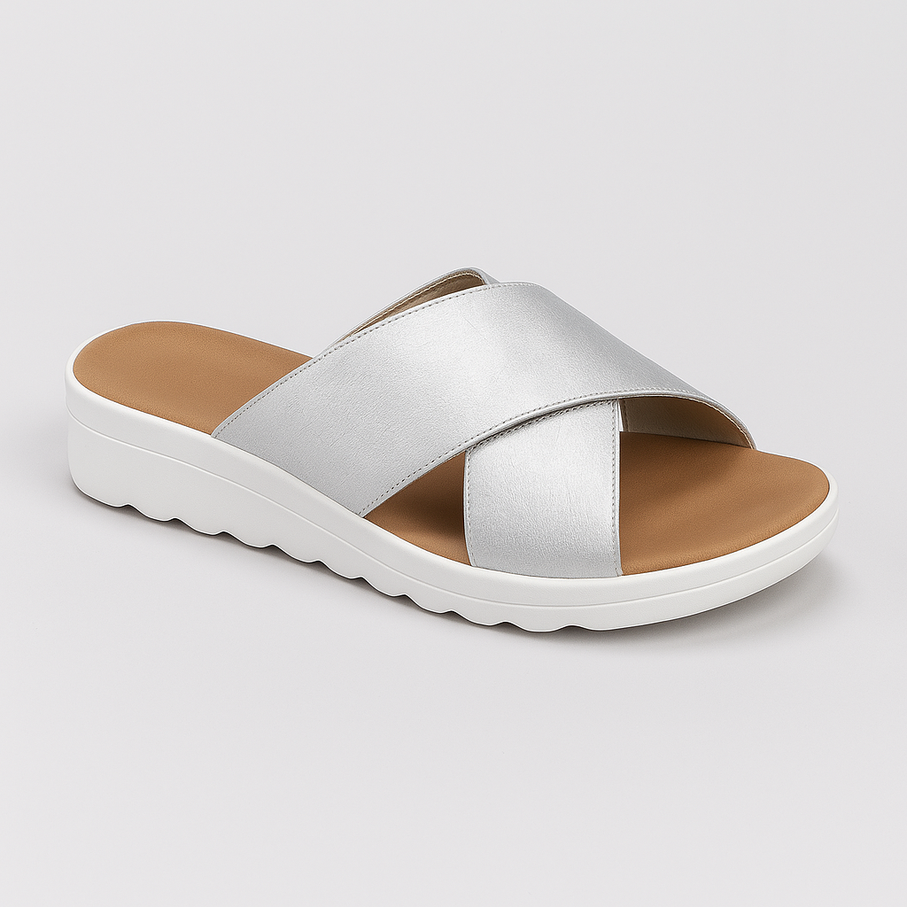 Slide sandal with wide crisscross straps and contoured sole.
