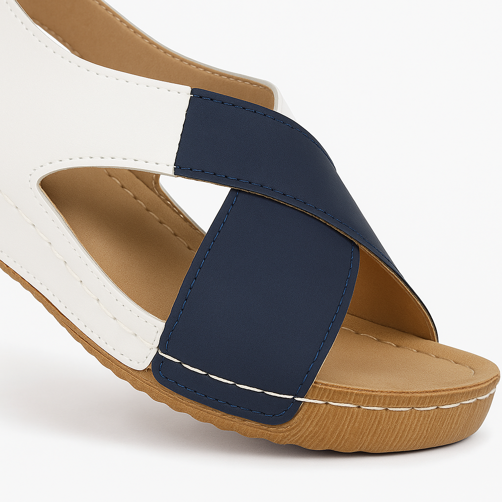 Two-tone wedge sandals with open toe, cross-strap design, and cushioned sole for casual summer wear