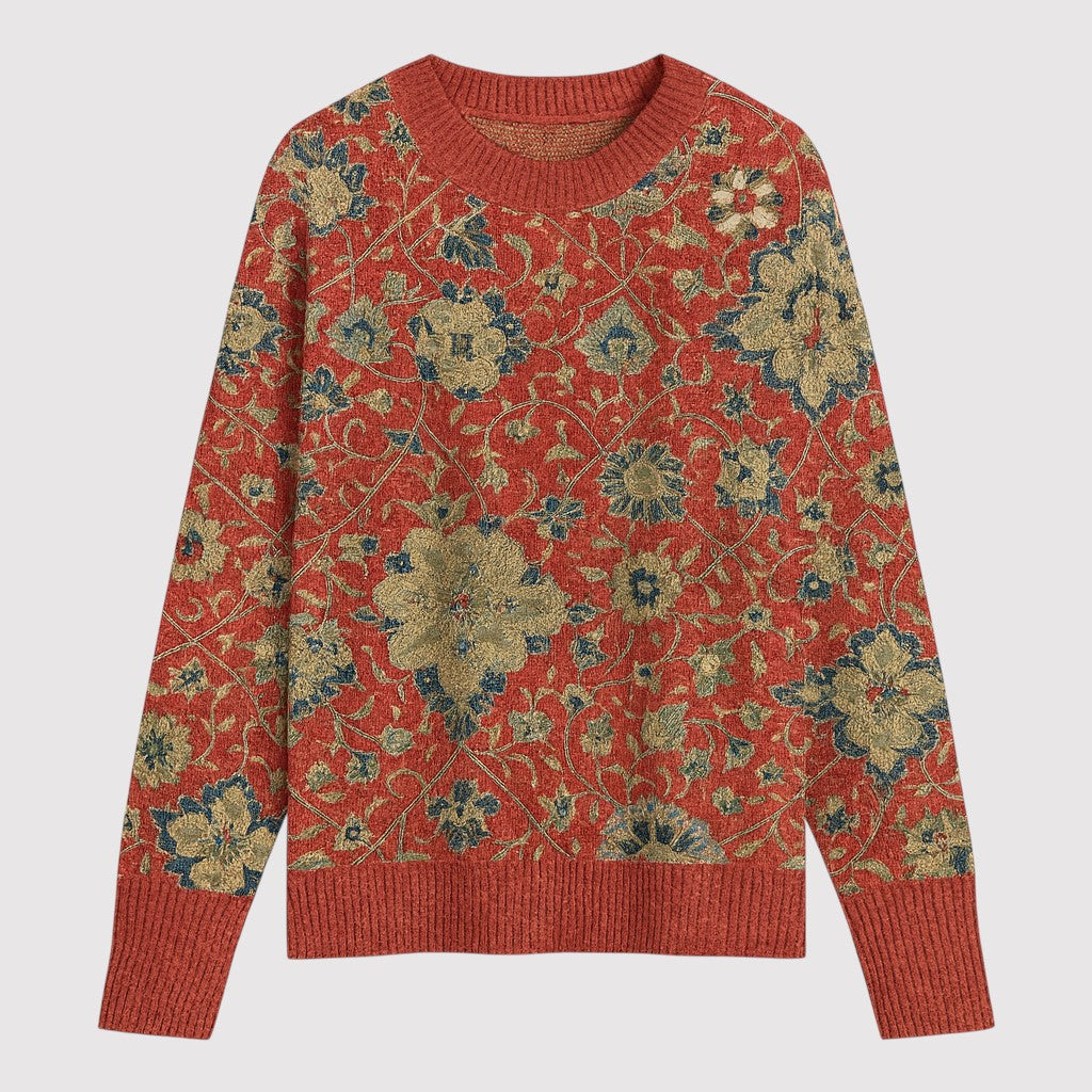 A patterned turtleneck sweater featuring intricate paisley and floral designs, with ribbed cuffs, hem, and a tall ribbed turtleneck.