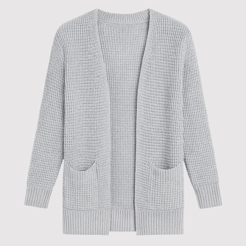A long open-front knit cardigan with a textured waffle pattern, ribbed cuffs and hem, and two front patch pockets.