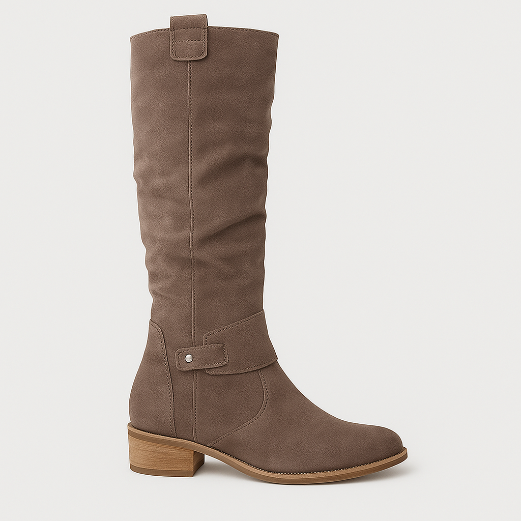 Knee-high suede boots with low block heels, side zips, and decorative straps.