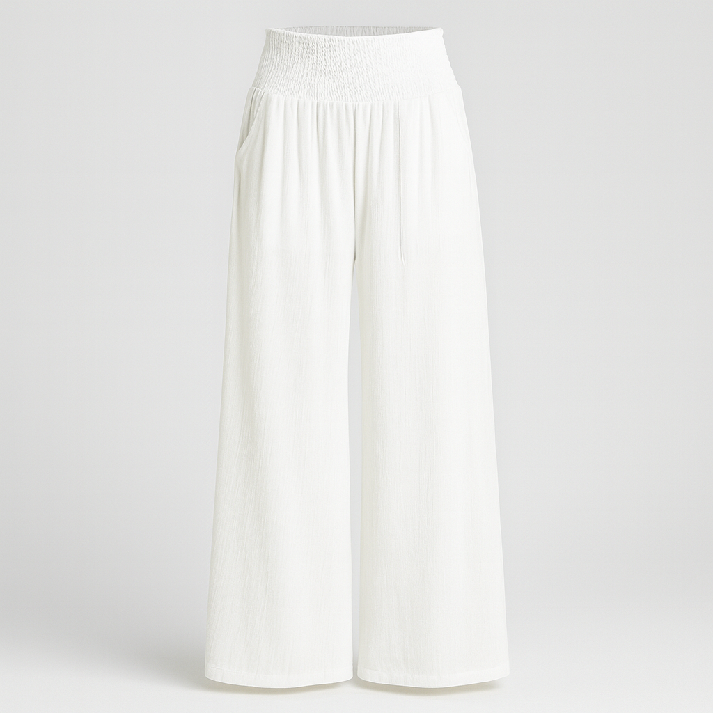 Wide-leg pants with smocked waistband and pleated detailing.