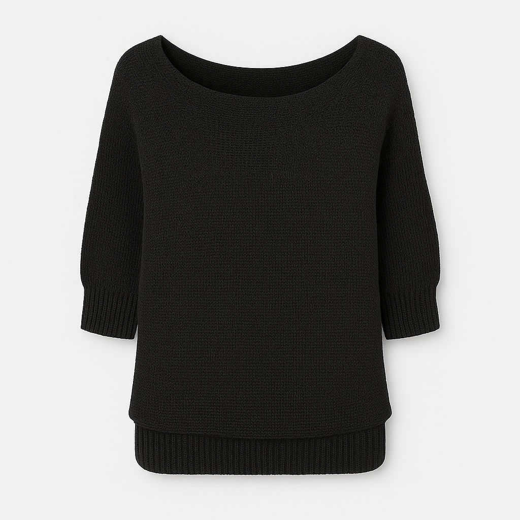 Knit top with relaxed fit, scoop neckline, and ribbed cuffs designed for versatile casual wear