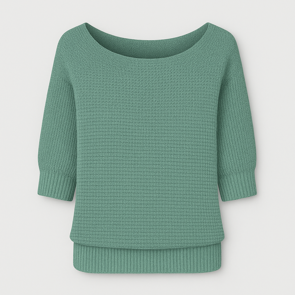 Knit top with relaxed fit, scoop neckline, and ribbed cuffs designed for versatile casual wear