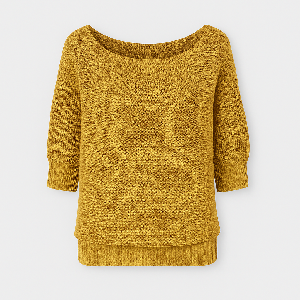 Knit top with relaxed fit, scoop neckline, and ribbed cuffs designed for versatile casual wear