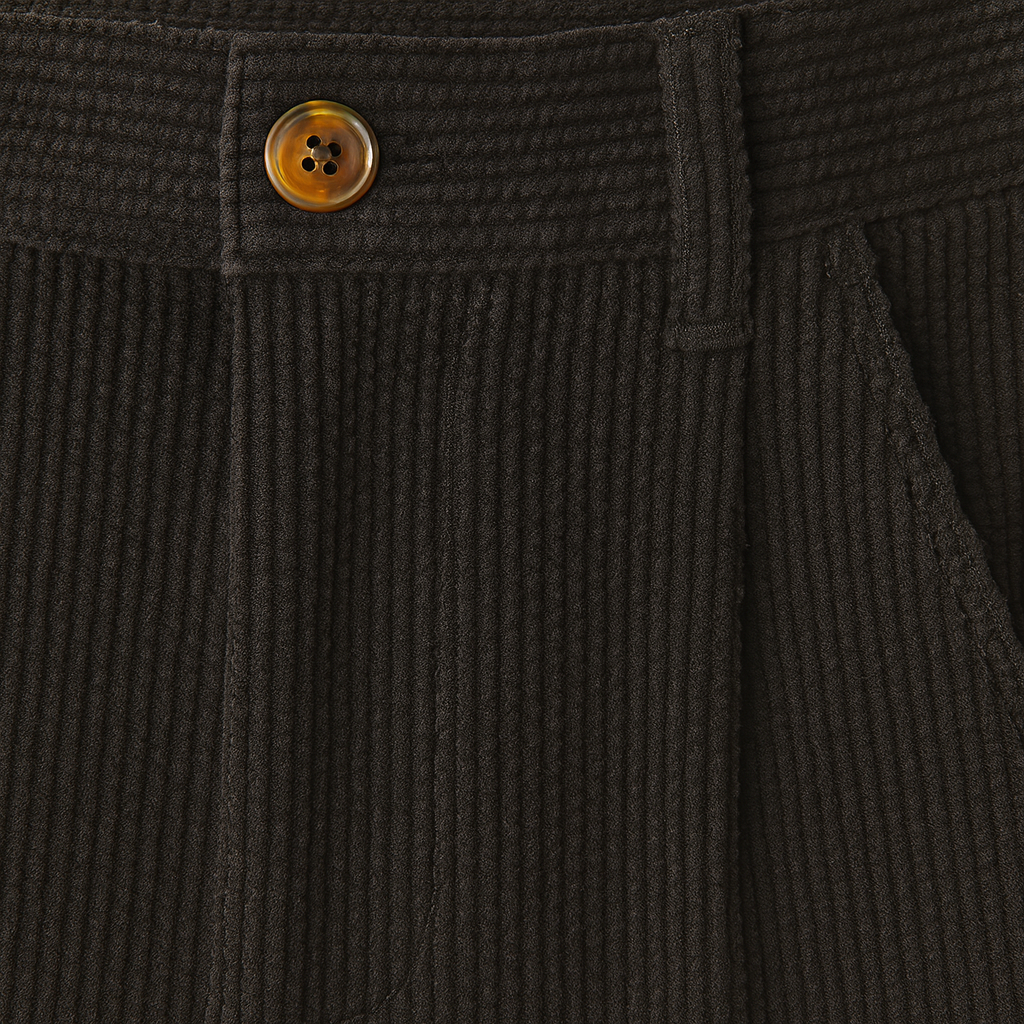 Straight-leg corduroy trousers with rolled cuffs, belt loops, side pockets, and button-front closure.