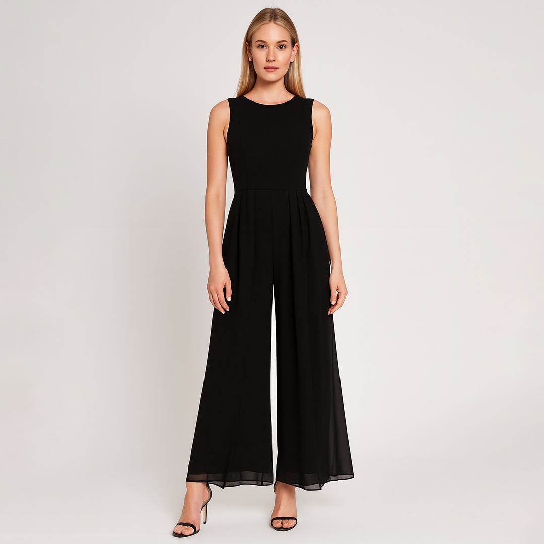 A sleeveless jumpsuit featuring ruffled shoulder details, a fitted waist with a matching fabric belt tied in a bow, and wide-leg pants for a chic and feminine silhouette.