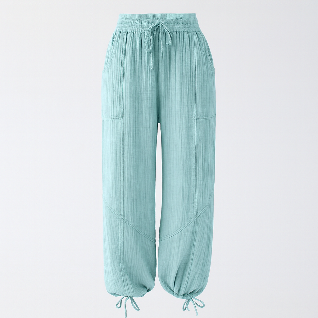textured wide-leg lounge pants with drawstring waist and cinched hems, styled casually for relaxed wear.