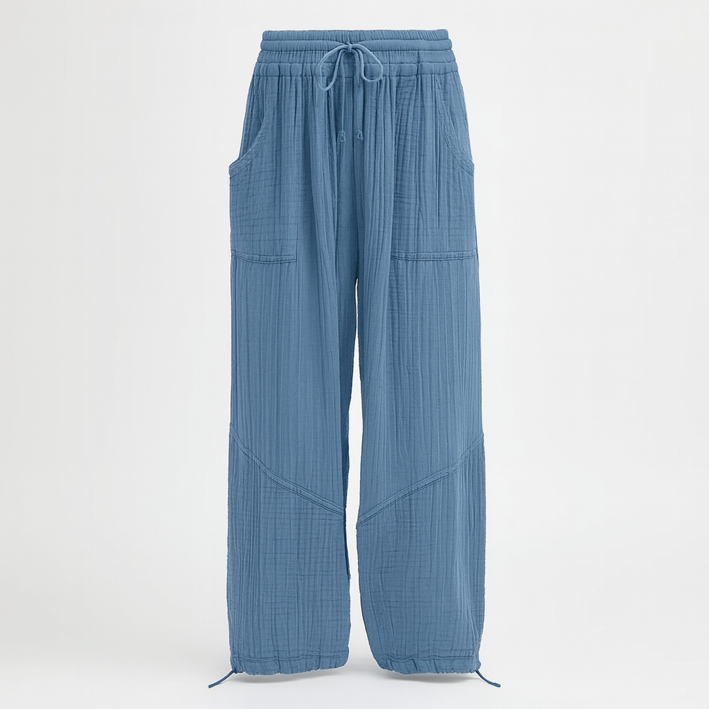 textured wide-leg lounge pants with drawstring waist and cinched hems, styled casually for relaxed wear.