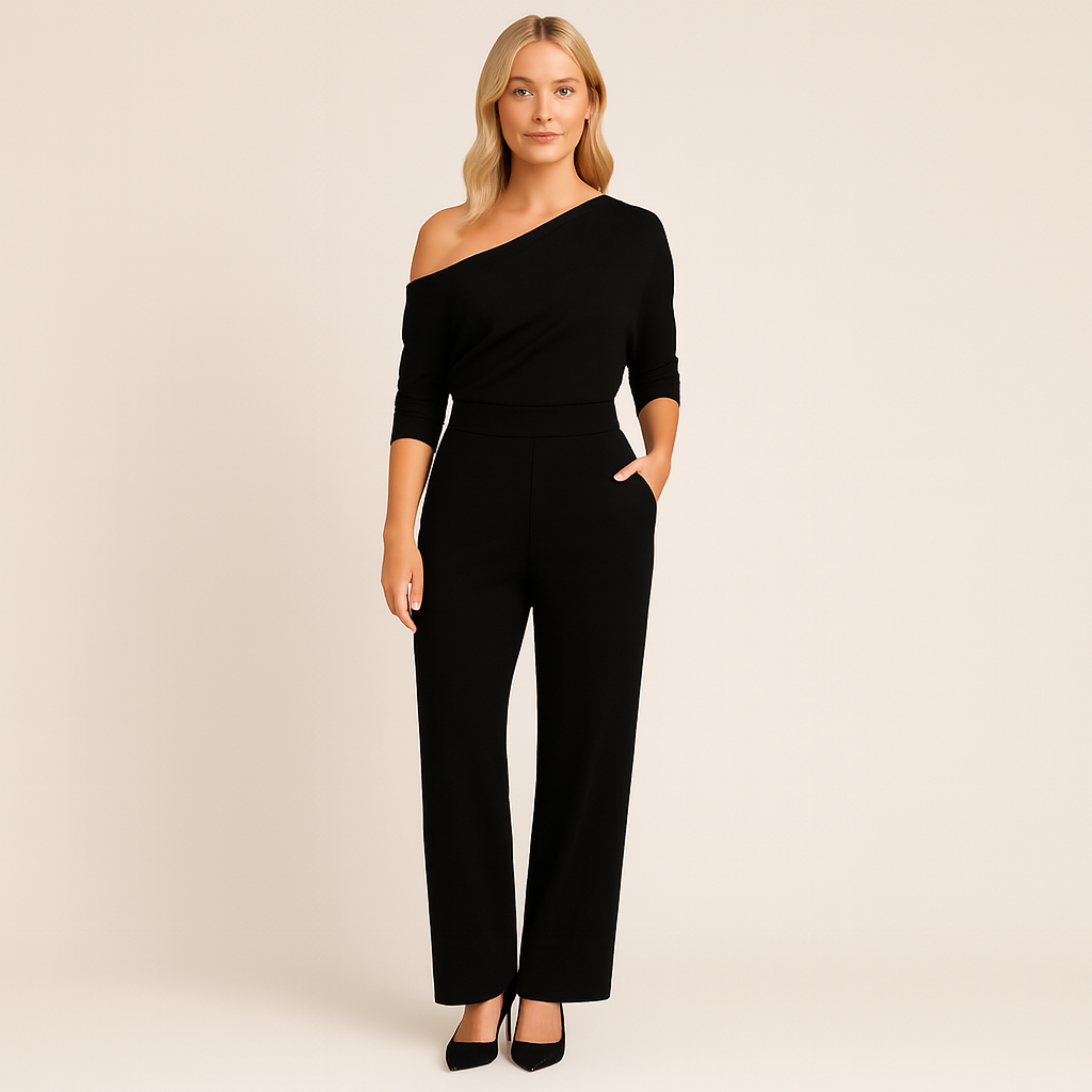 One-shoulder jumpsuit with asymmetric neckline, tailored waist, and wide-leg fit, styled for modern elegance