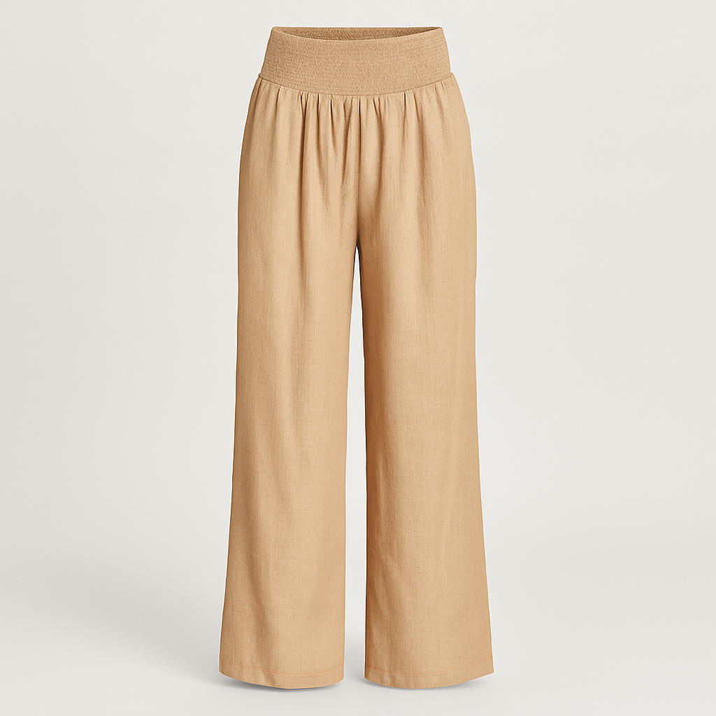 Wide-leg linen-blend pants with pleated front and smocked high waist, styled for relaxed summer beachwear