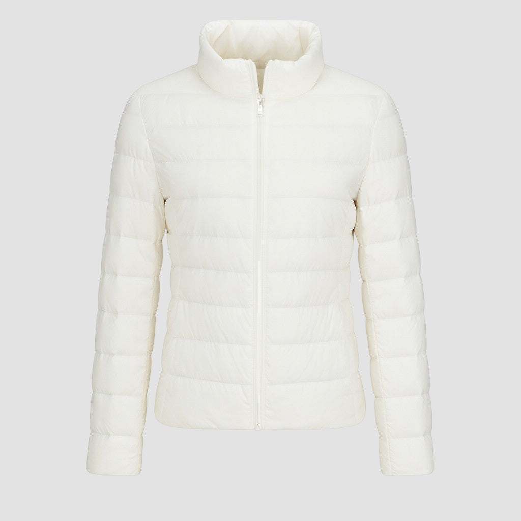 A lightweight quilted puffer jacket with a high stand collar, front zipper closure, and long sleeves.