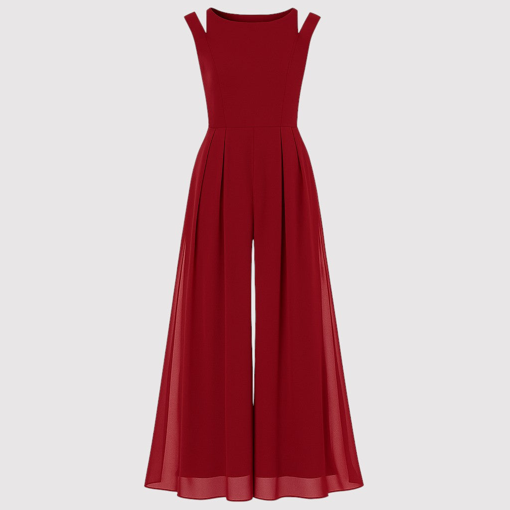 A sleeveless jumpsuit with a fitted bodice, wide shoulder straps, and wide-leg pants featuring a flowing chiffon overlay for an elegant look.