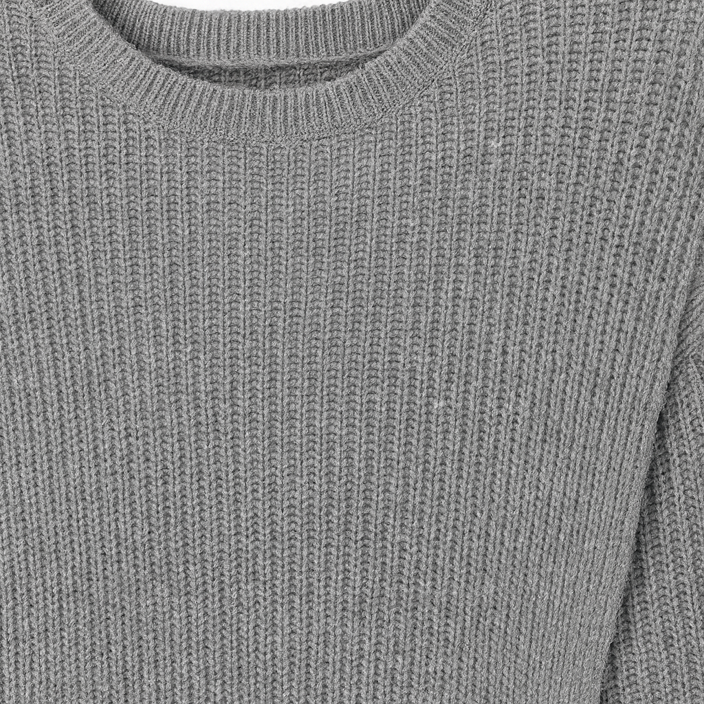 Ribbed knit long-sleeve dress with a round neckline and overlapping front hem design.