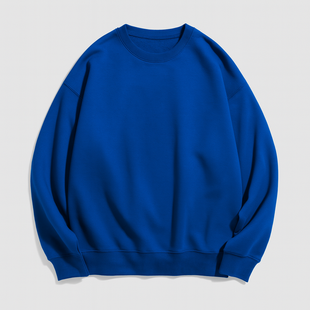 A plain crewneck sweatshirt with long sleeves, ribbed cuffs, hem, and neckline, featuring a relaxed fit.