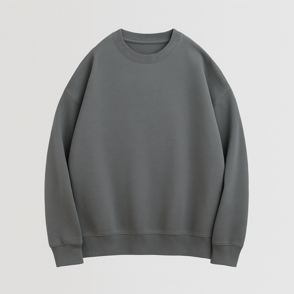 A plain crewneck sweatshirt with long sleeves, ribbed cuffs, hem, and neckline, featuring a relaxed fit.