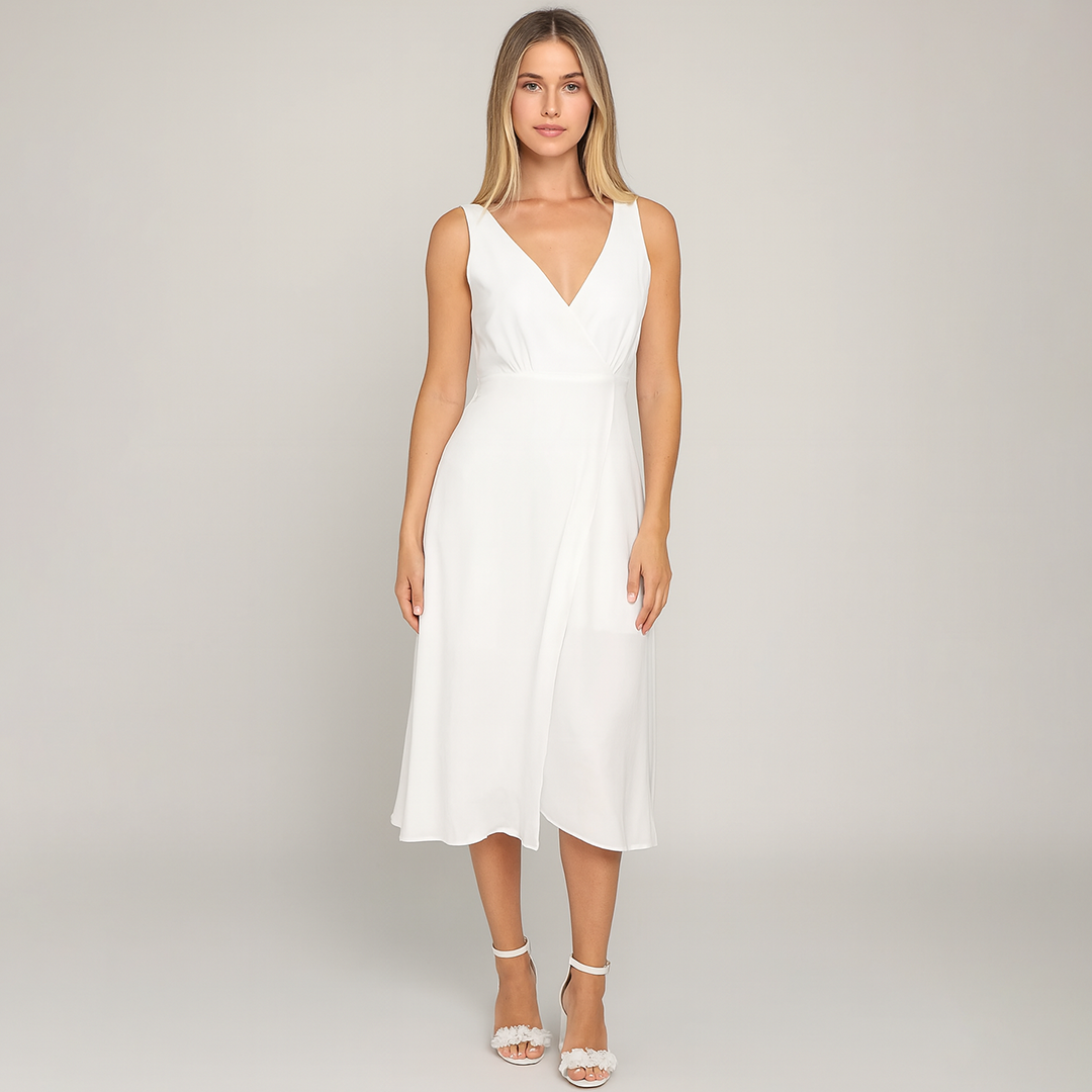 White block-heeled sandals with ankle straps and floral appliqués, perfect for weddings or special occasions