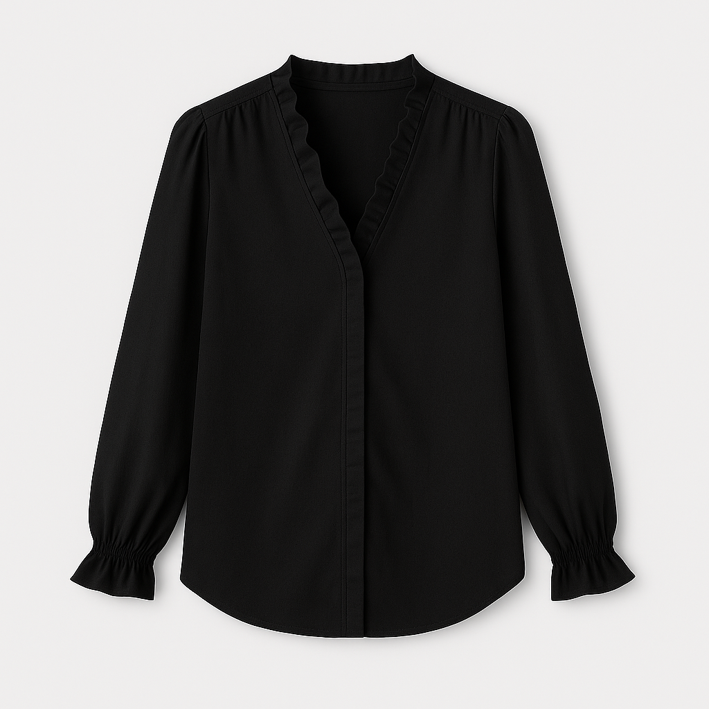 Blouse with V-neckline and ruffle trim along neckline and cuffs.