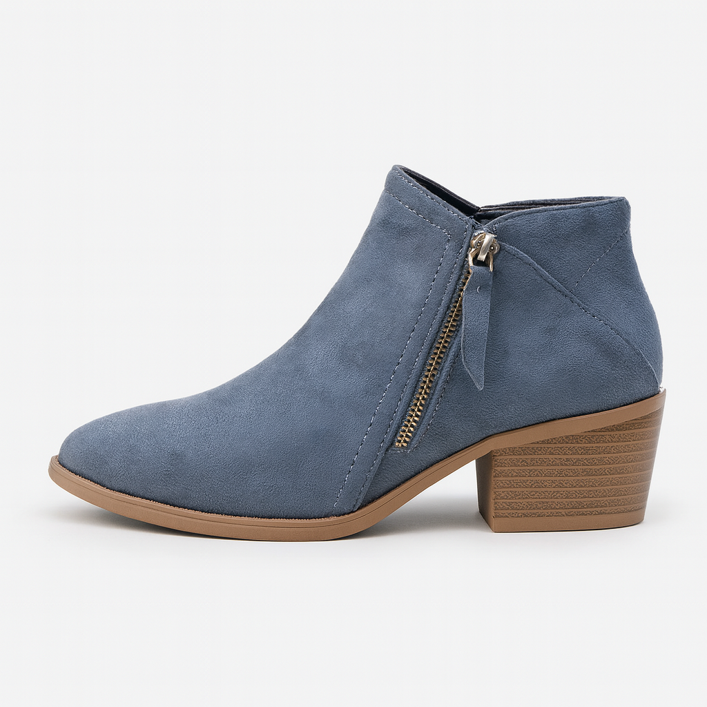 Suede ankle boots with side zips, smooth finish, and low stacked wooden heels.
