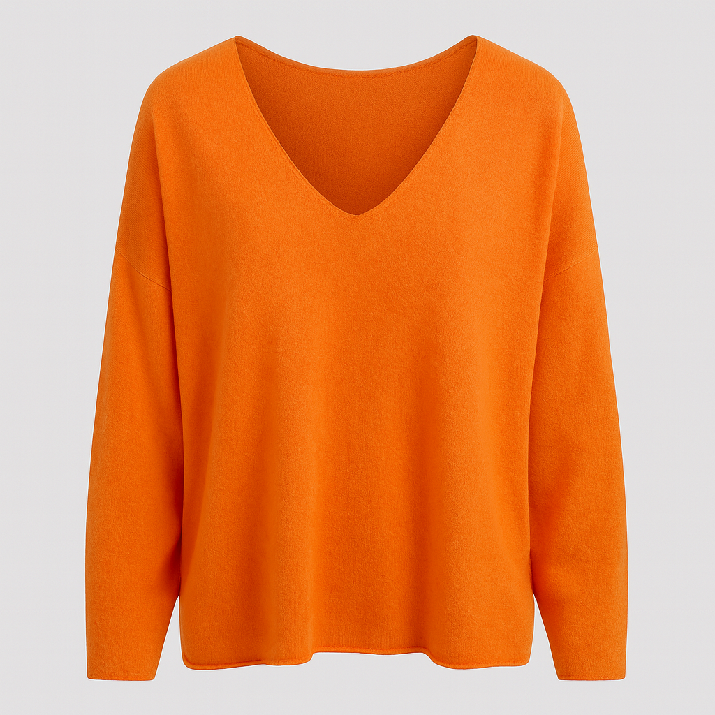 Oversized knit sweater with deep V-neck and long sleeves.