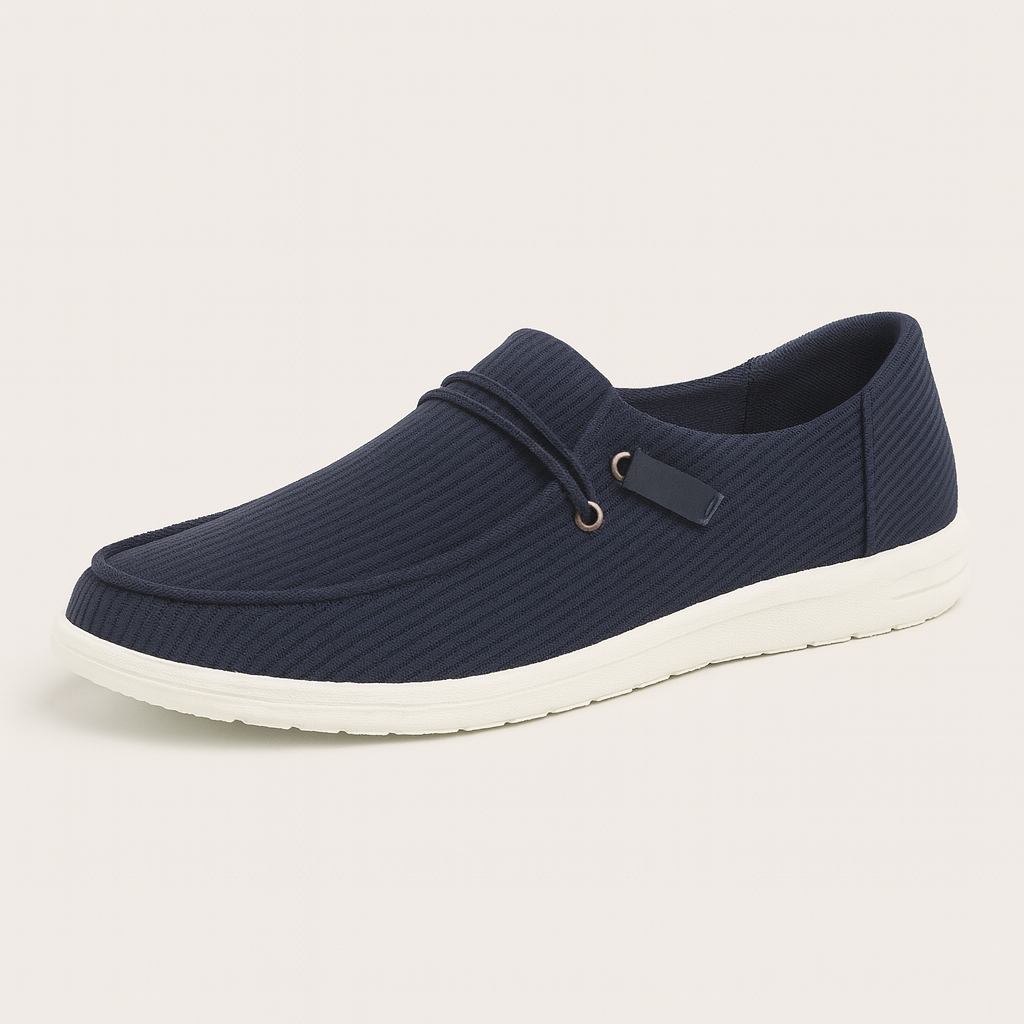 Slip-on casual loafers with ribbed fabric texture, round toe, lace-up accent on the side, and cushioned lightweight sole.