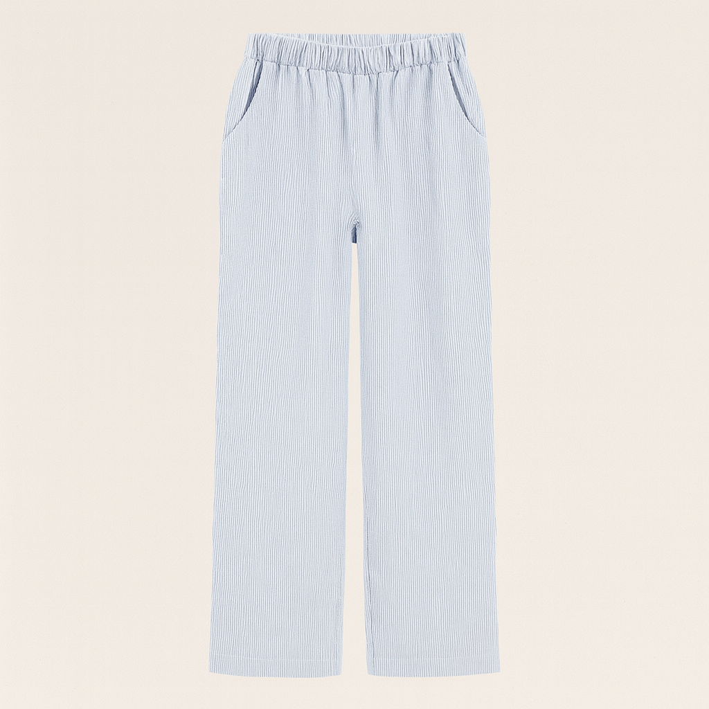 Relaxed cotton pants with elastic waistband and subtle pinstripe texture.