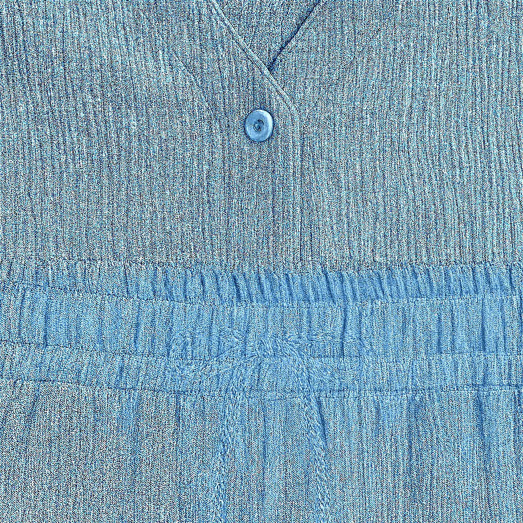 Relaxed lounge set with button-up top and wide-leg pants, styled for lightweight casual comfort