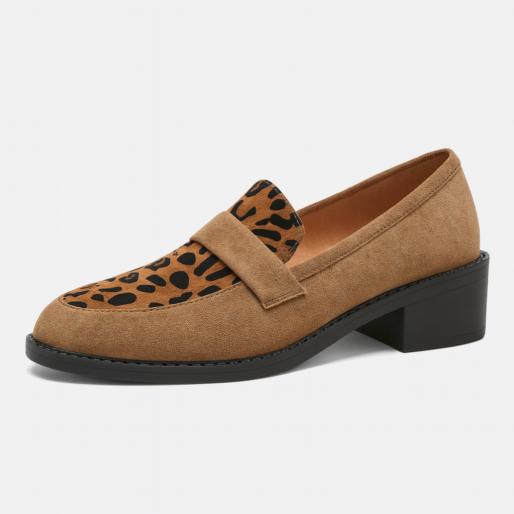 Loafer shoe with a low block heel and animal print detail on the upper.