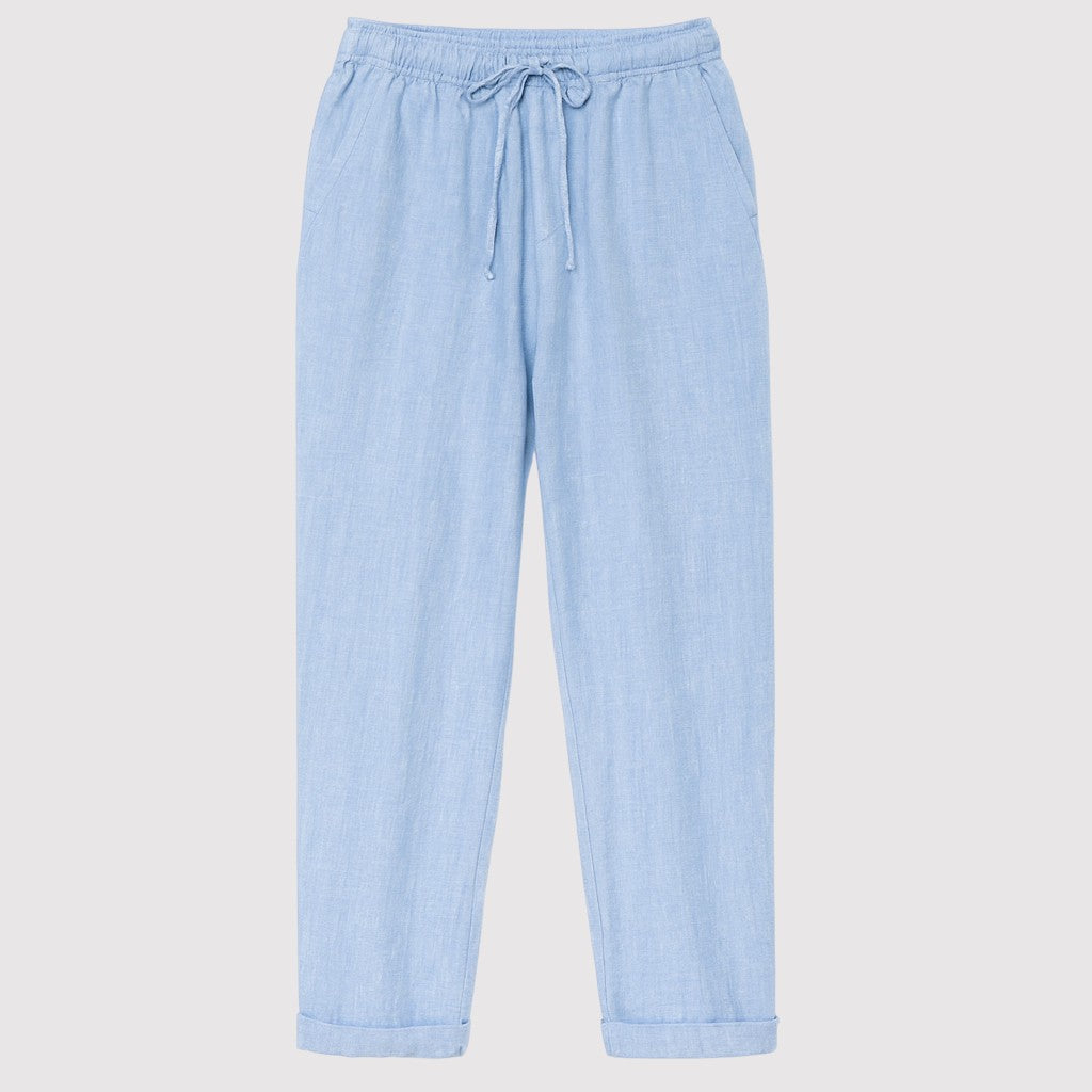 Relaxed linen drawstring pants with straight-leg fit and elastic waistband, styled for a casual everyday look