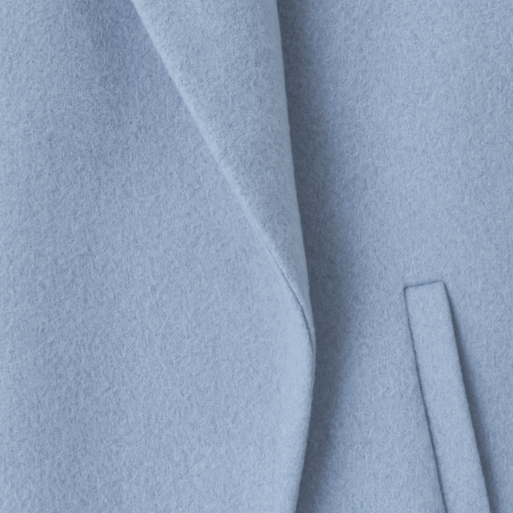 Long oversized coat with a notched lapel collar, straight silhouette, and two front welt pockets.