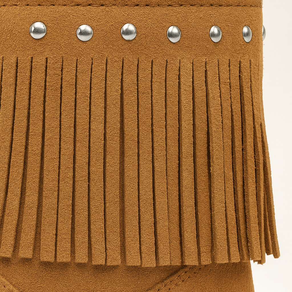 Suede ankle boot with fringe detailing and a row of decorative studs around the top.