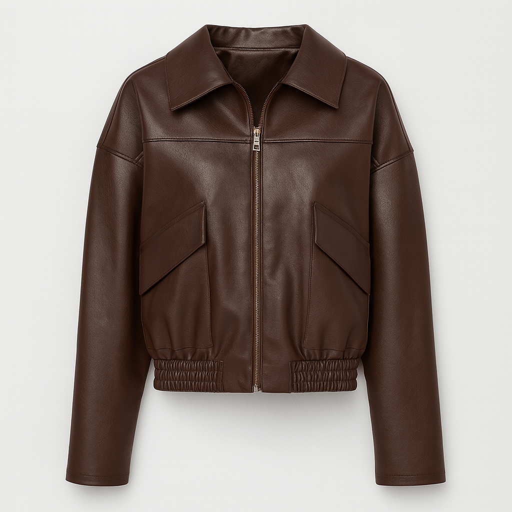 A cropped dark brown faux leather jacket with a pointed collar, zip front, flap chest pockets, and an elasticated hem.