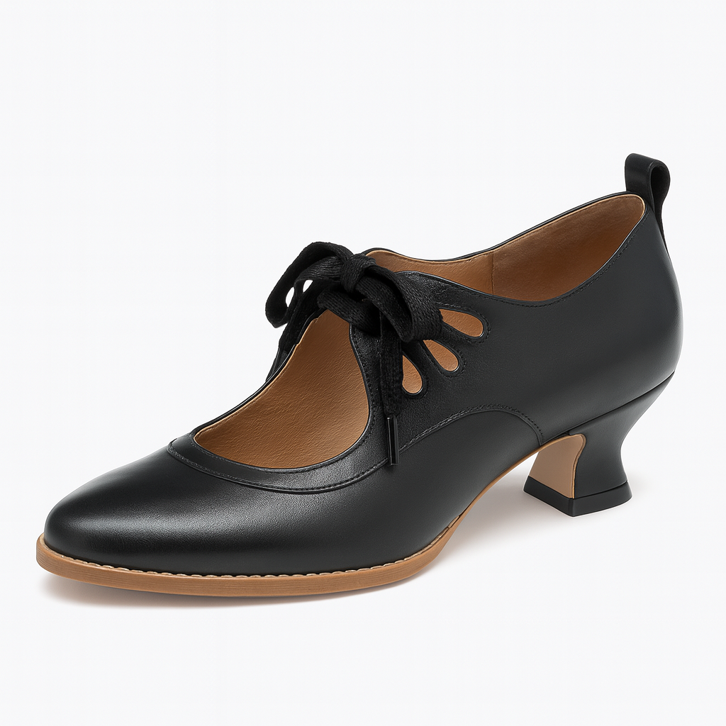 Heeled shoe with lace-up front, cutout details, and rounded square heel.