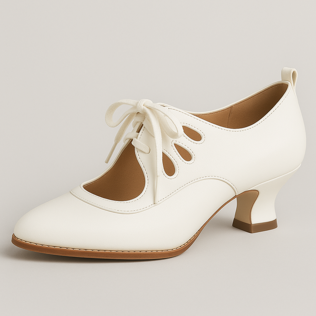 Heeled shoe with lace-up front, cutout details, and rounded square heel.