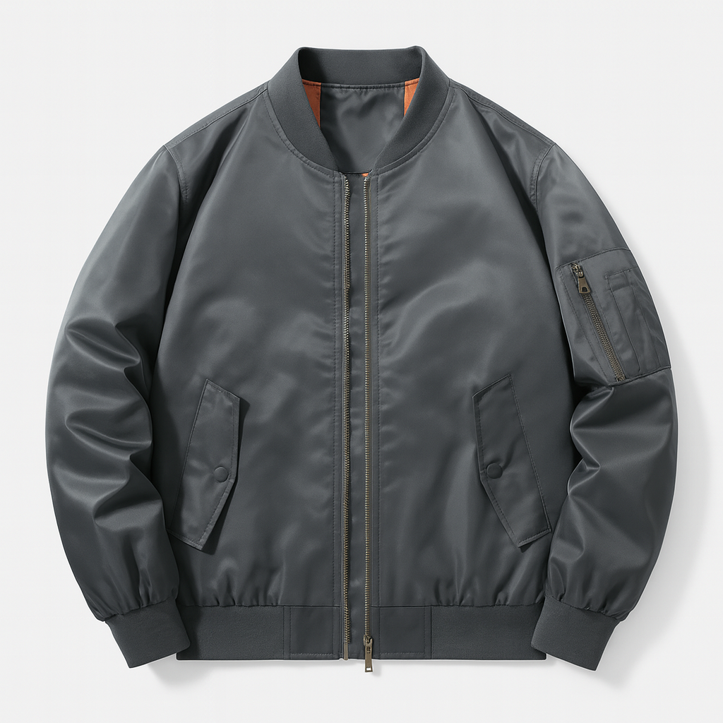 Bomber jacket with front zipper, ribbed cuffs, and utility sleeve pocket designed for versatile everyday wear