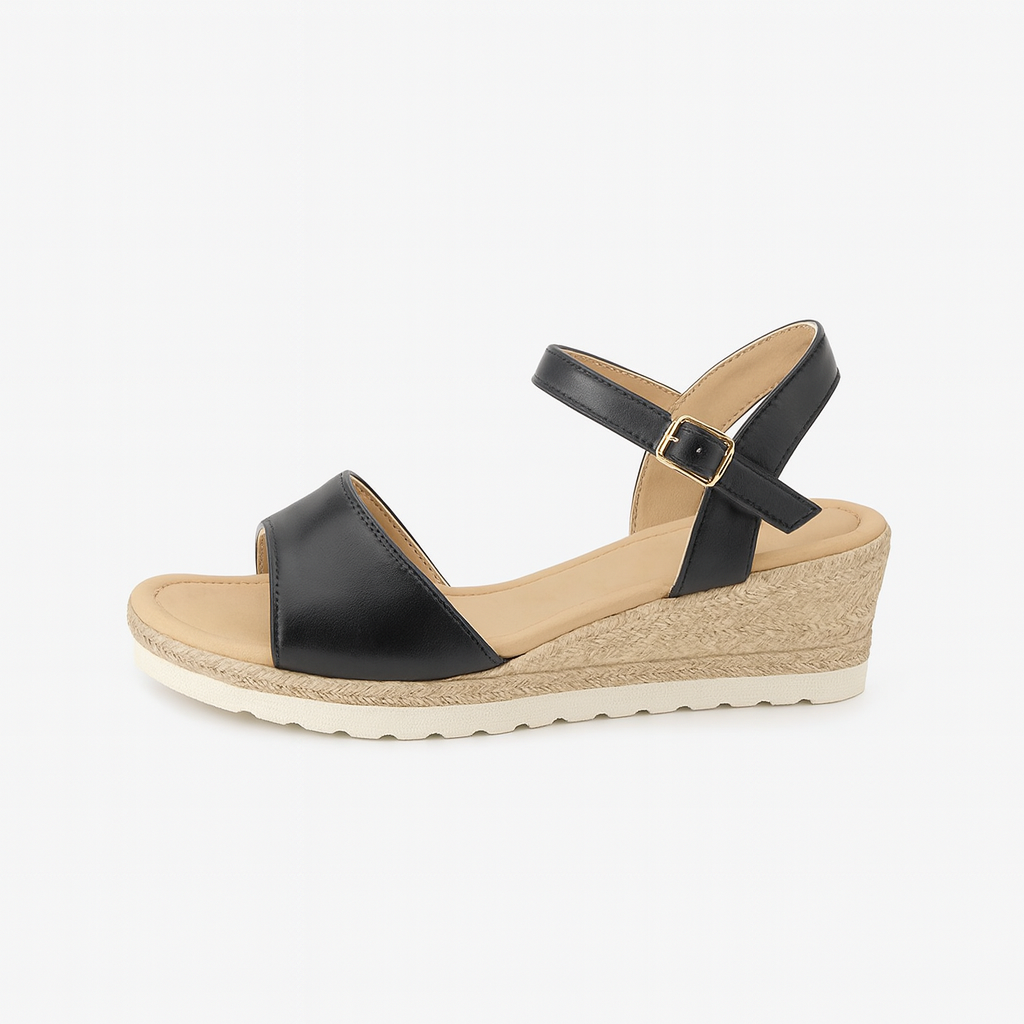 Wedge sandal with ankle strap, buckle closure, and textured midsol