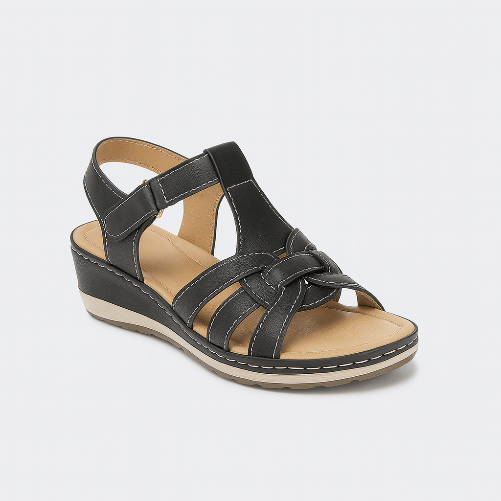 Wedge sandal with multiple straps, front knot detail, and contrast stitching.