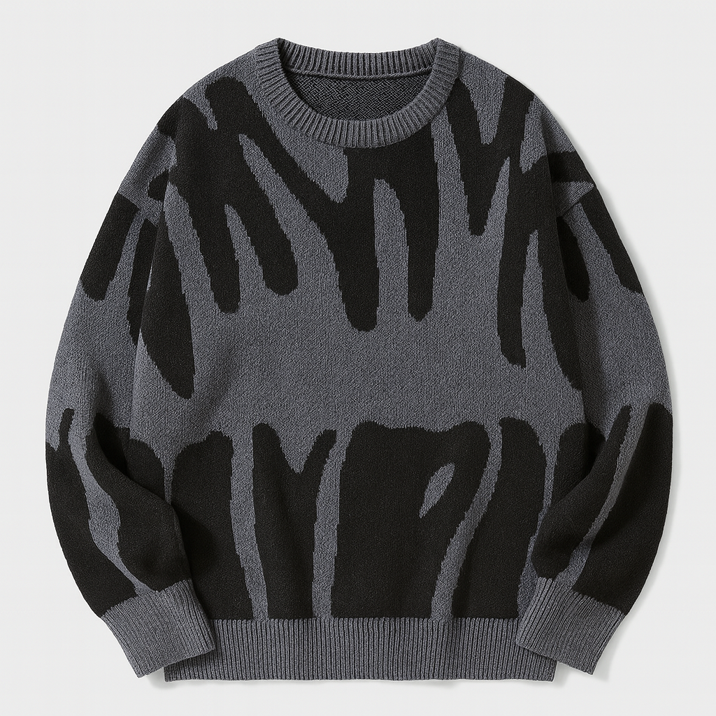 Knit sweater with bold abstract pattern, crew neckline, and ribbed cuffs designed for modern casual wear